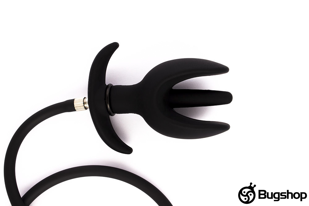 Inflatable anal plug