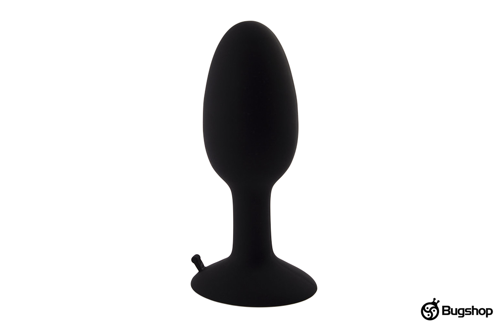 Oval anal plug with an internal ball
